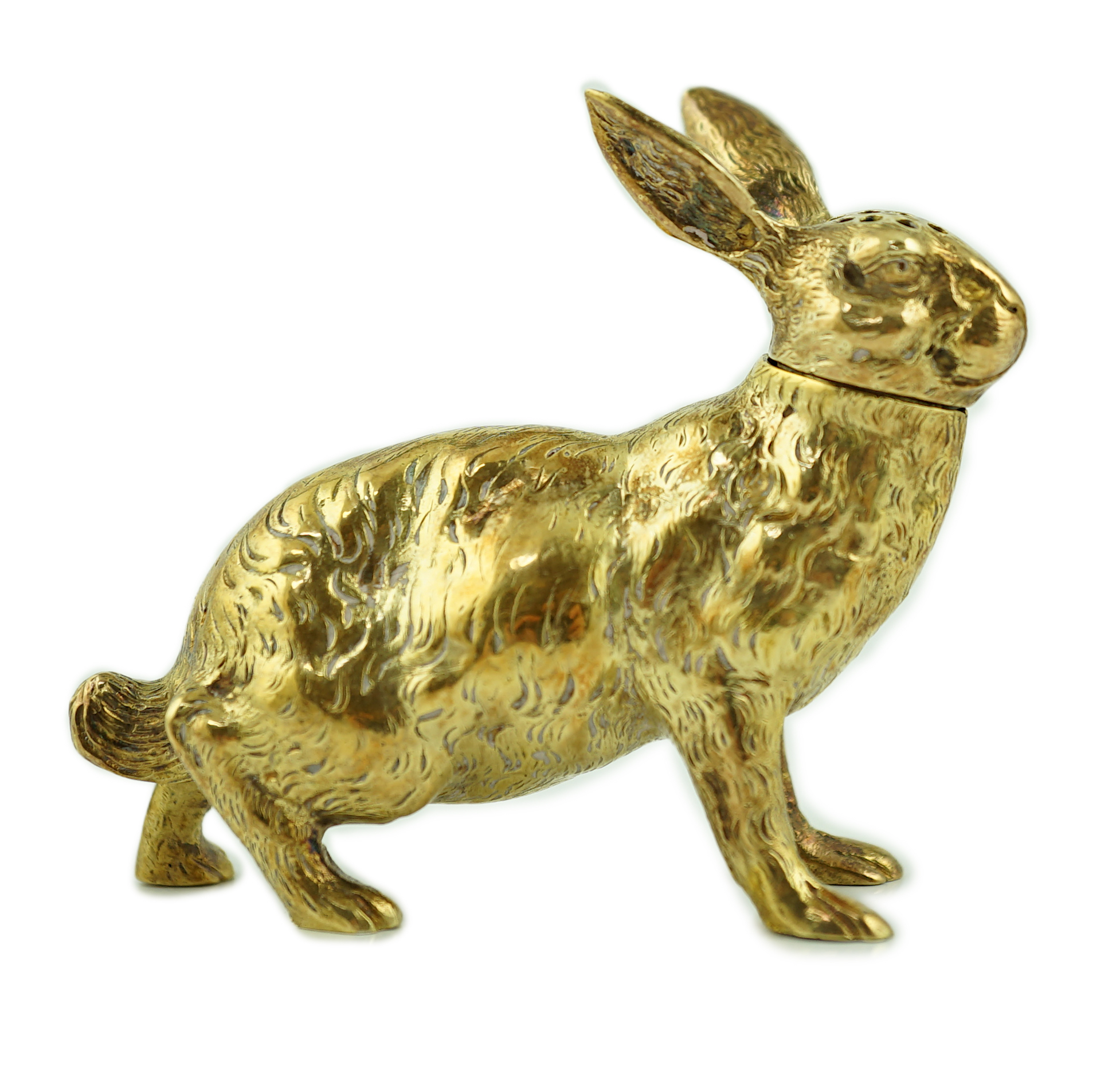 An early 20th century German novelty 800 standard silver gilt pepperette, modelled as a rabbit